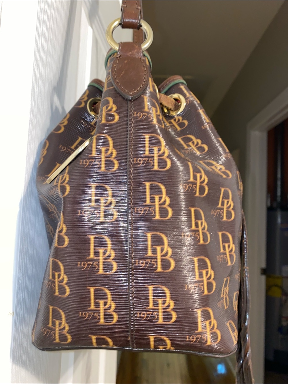 Dooney & Bourke Brown DB Monogram Braided Drawstring Bucket Bag - Picture 5 of 12